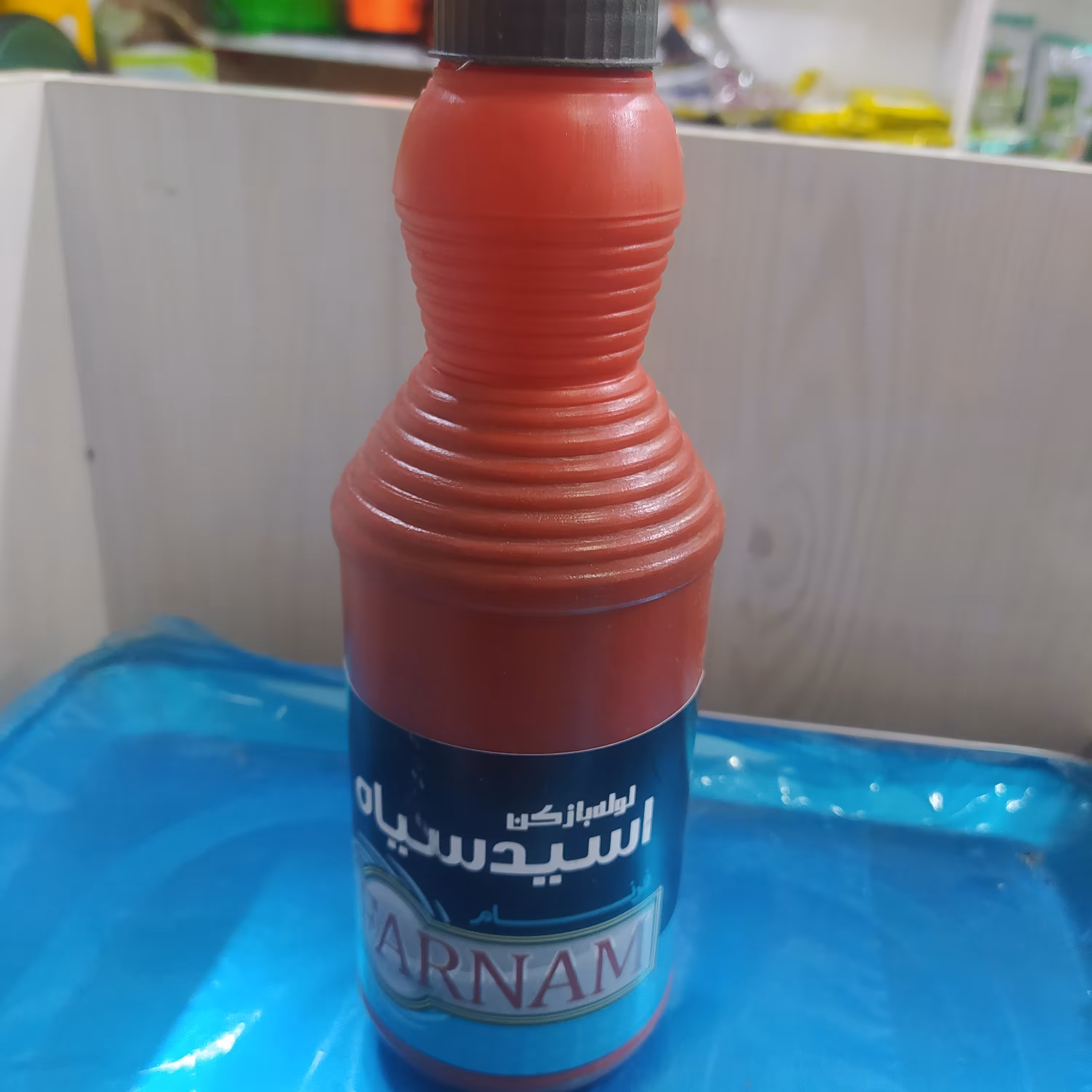 اسید چاه جهت باز کردن لو له های فاضلاب.یک لیتری