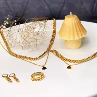 ست کارتیر استیل طلایی باآویزقلب دخترانه زنانه،رنگ ثابت،تست واکتس شده،ارسال رایگان،مناسب استفاده دائم و هدیه،کار استیل