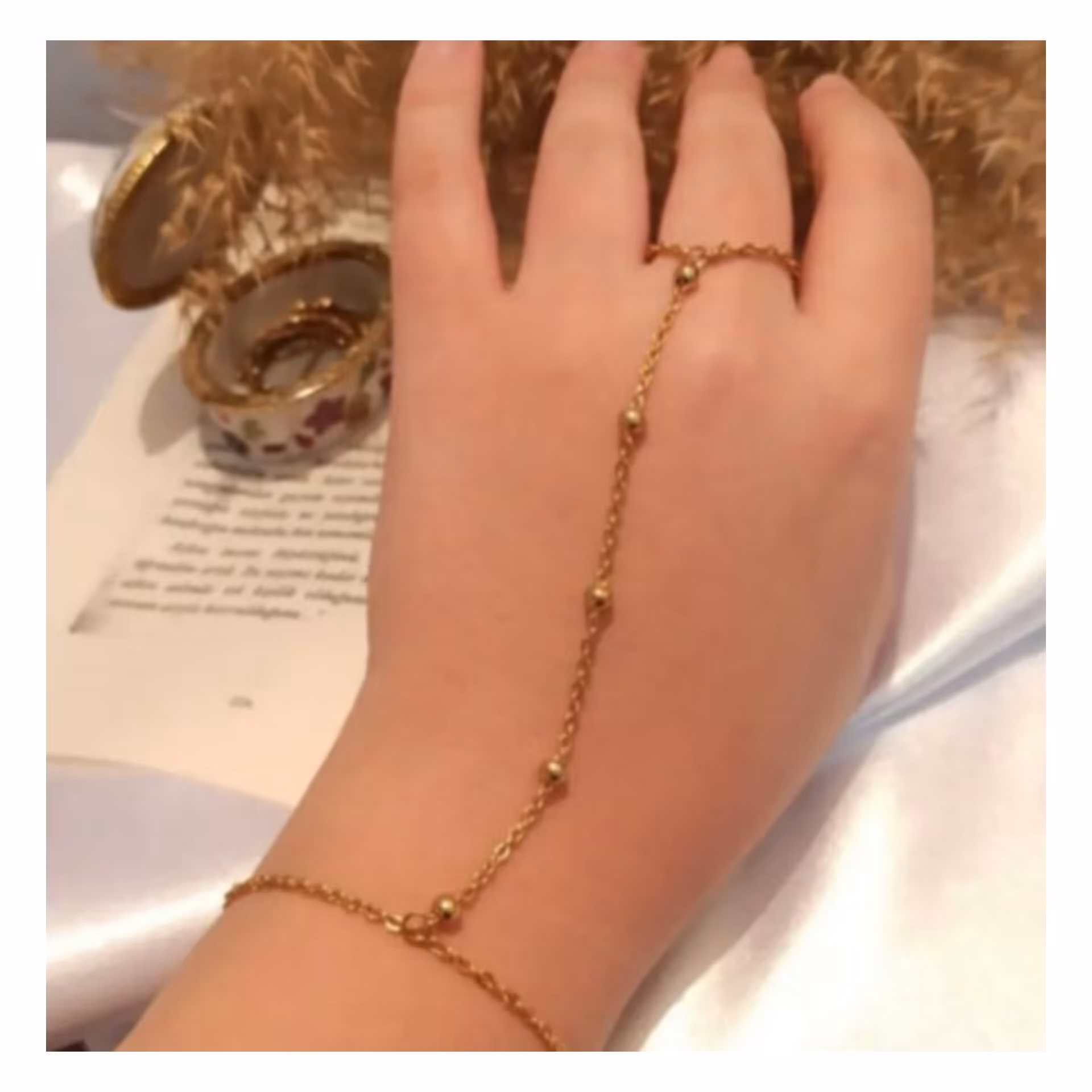 دستبند (تمیمه) زنجیر توپی استیل رنگ طلایی 