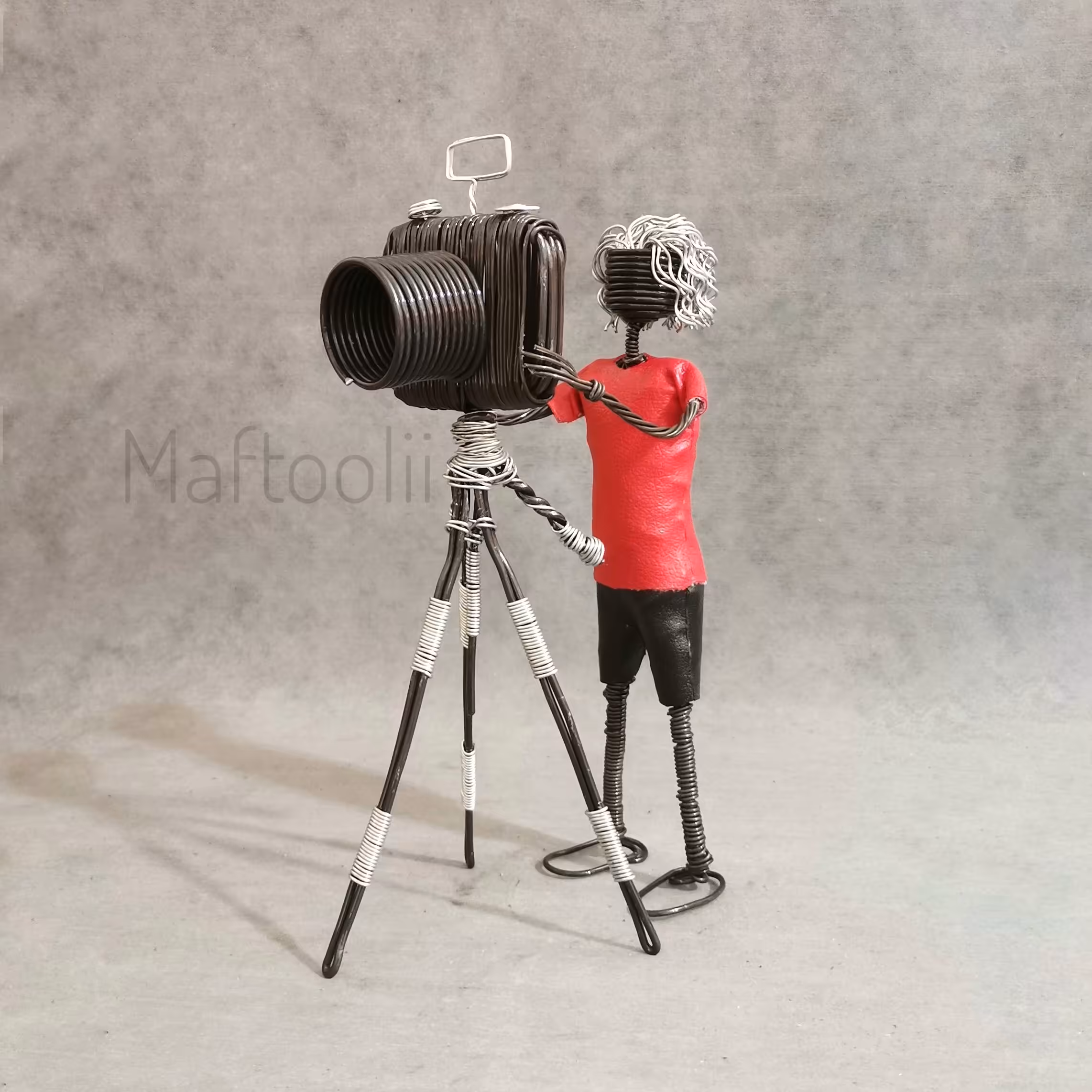 مجسمه دکوری عکاس پسر