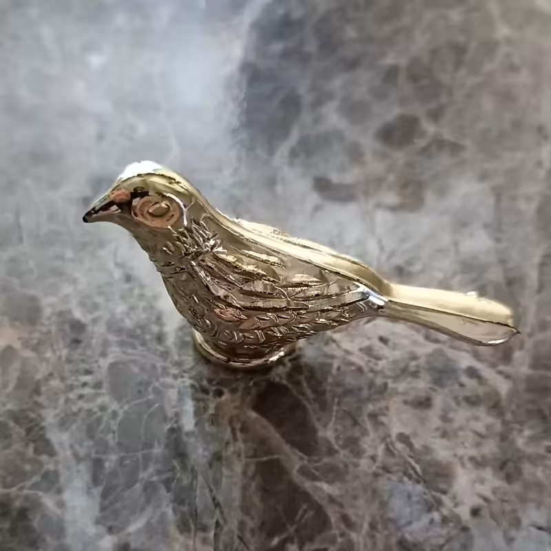 اکسسوری گنجشک پلاستیک فشرده طلایی