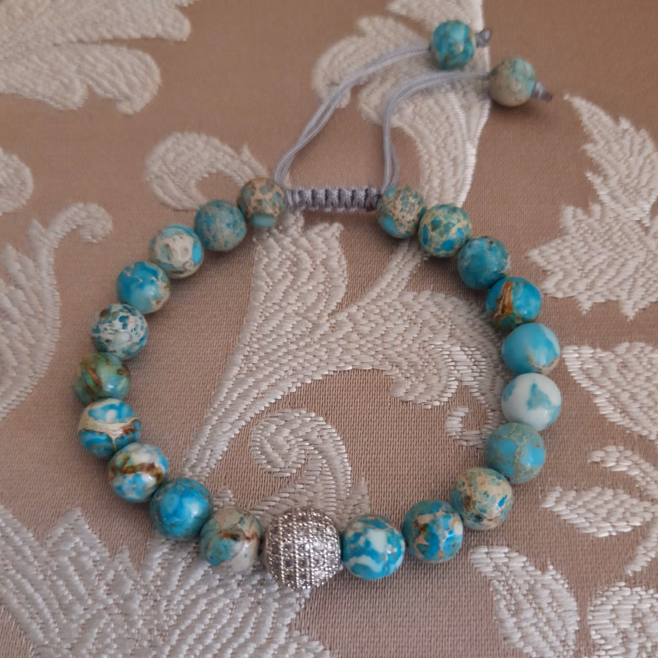 دستبند فیروزه همراه گوی سوارسکی 