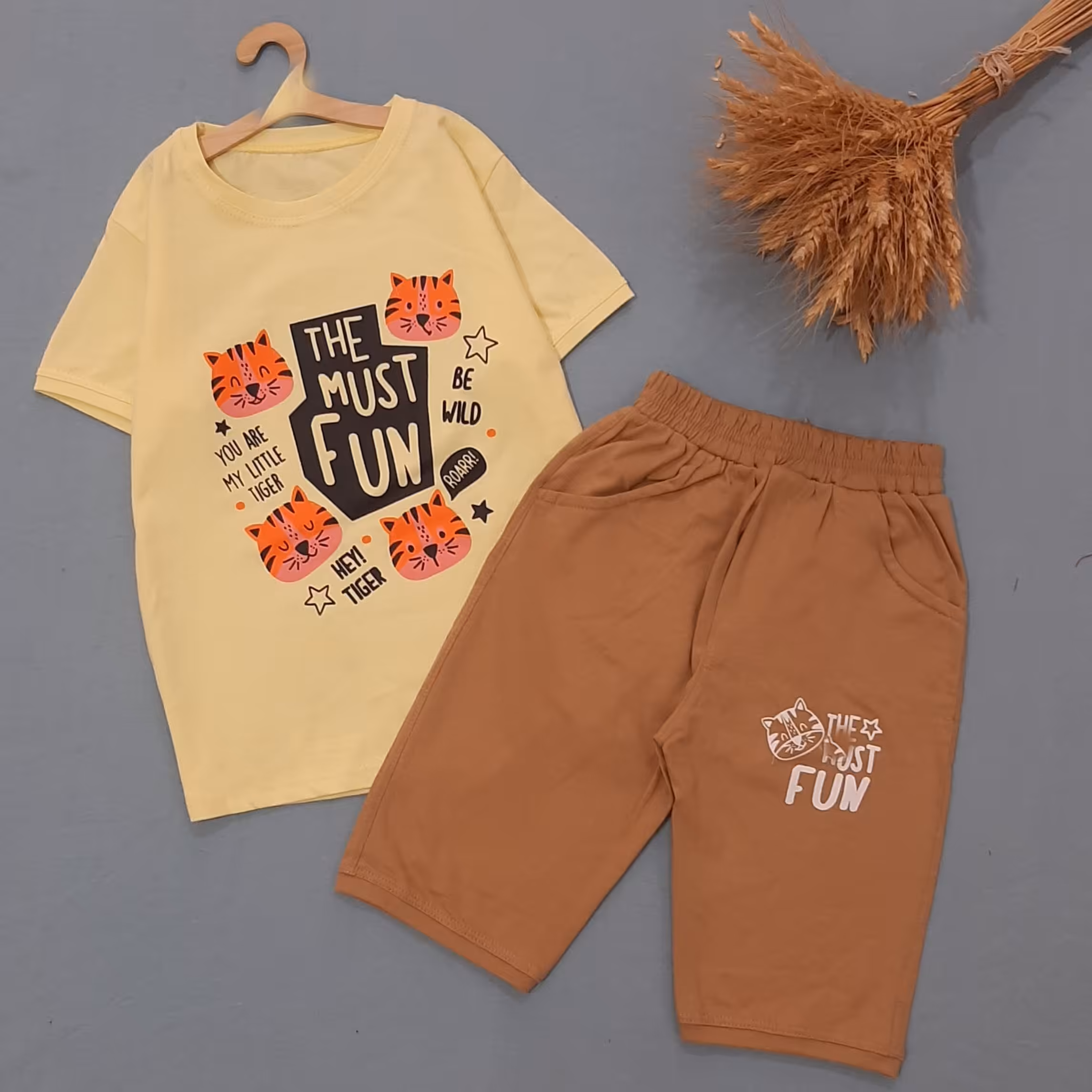 ست تیشرت و شلوارک طرح کتان بچگانه اسپورت پسرانه و دخترانه سایز 45 رنگ لیمویی کرم تیشرت شلوارک دخترونه پسرونه