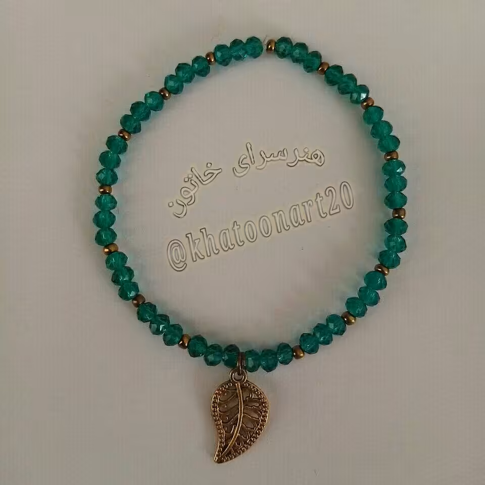 دستبند کریستالی سبز با آویز برگ