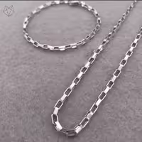 ست دستبند و گردنبند زنجیر آجری رنگ نقره‌ای