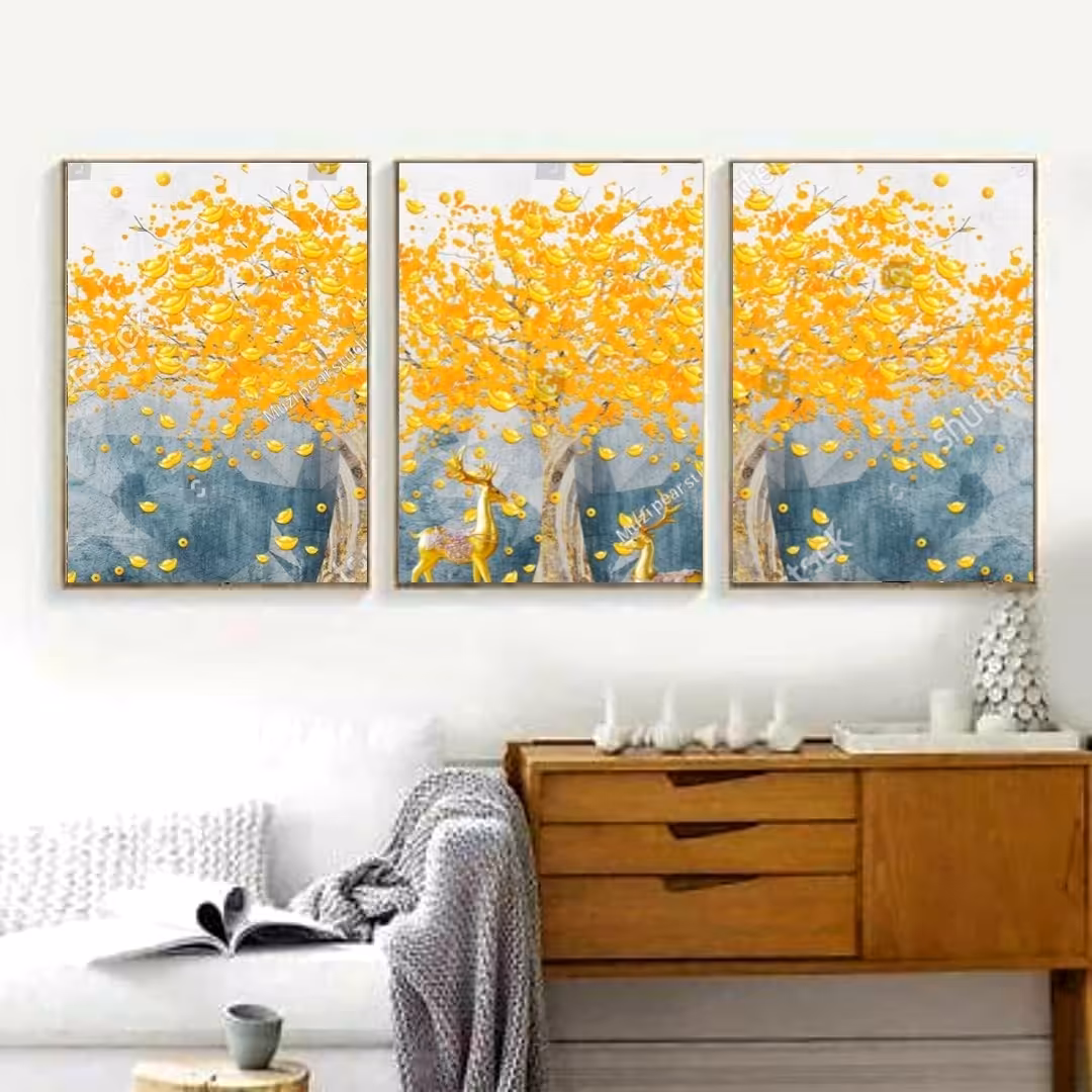 تابلو دکوراتیو فانتزی درخت با برگ های زرد وگوزن های طلایی سه تکه 