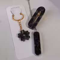 ست گردنبند و گیره مو و سرسوئیچی قاصدک رزینی