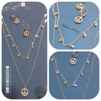 نیمست گردنبند دو ردیفه اویزدار نگینی با گوشواره مدل چفتی نگینی