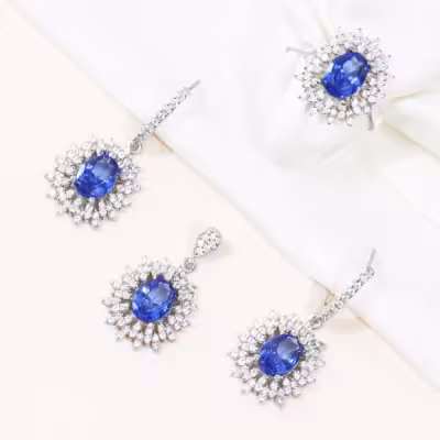 نیم ست نقره با سنگ توپاز آبی طرح خورشیدی زنانه کد 4501