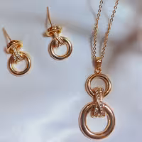 نیم ست  مدل حلقه دوتایی نگین دار و ضد حساسیت با دوام رنگ عالی