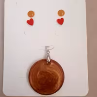 پلاک گردنبندی چرخ گردون مسی همراه دو جفت گلگوش