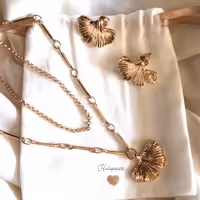 نیم ست بابونه استیل با روکش طلا Hulupuart برند Iam