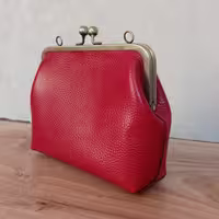 کیف دهانه فلزی چرم طبیعی گام 