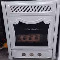 بخاری گازی 11000 هزار  طرح رها  هیزم دار (هزینه ارسال به عهده مشتریست )