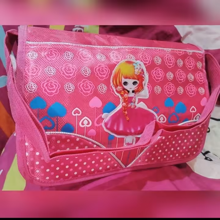 کیف دوشی دخترانه پارچه ای صورتی و جادار 