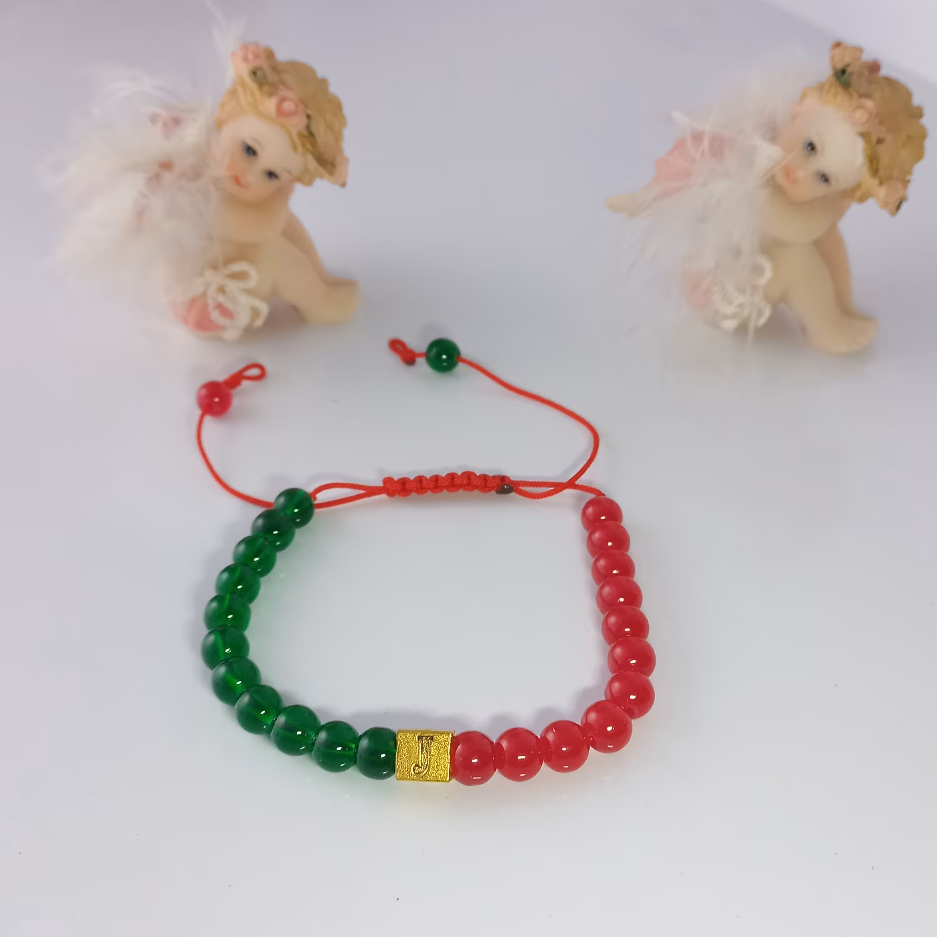 دستبند یلدایی دورنگ با اول اسم کد 07