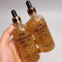 سرم و پرایمر طلا 24 عیار گلدزن گالری رژ مشکی 