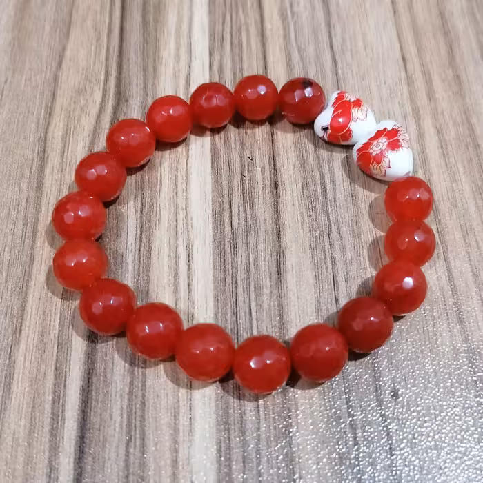 دستبند  عقیق با قلب سرامیکی (پس کرایه )