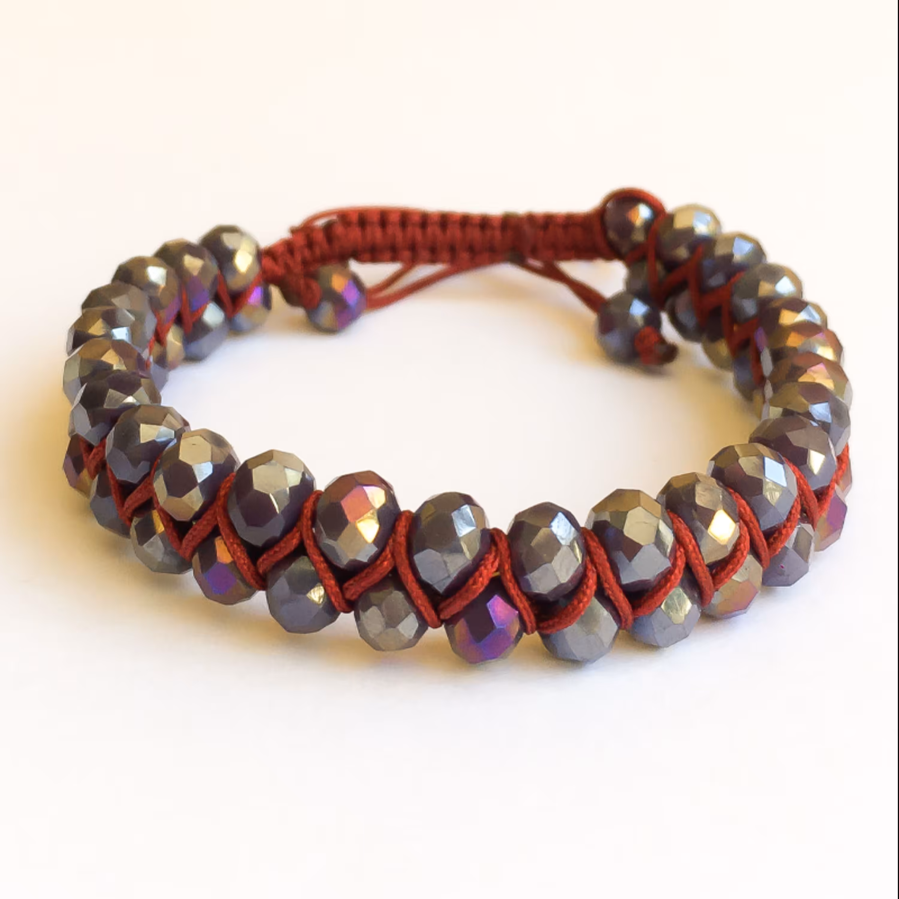 دستبند مدل شیفته تلفیقی از بافت و کریستال تراش دار