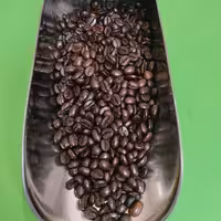 دانه قهوه ربوستا خالص اندونزی شکلاتی تیره کیلویی