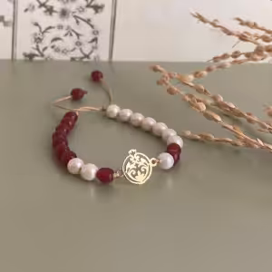 دستبند پلاک طلا و مهره انار