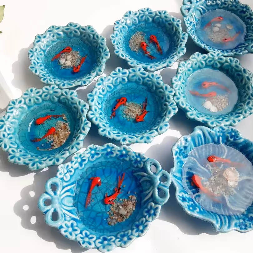 حوضچه سه بعدی رزینی.ماهی ها نقاشی شده هستند کار بسیار زیبا وشیک مناسب برای کادو