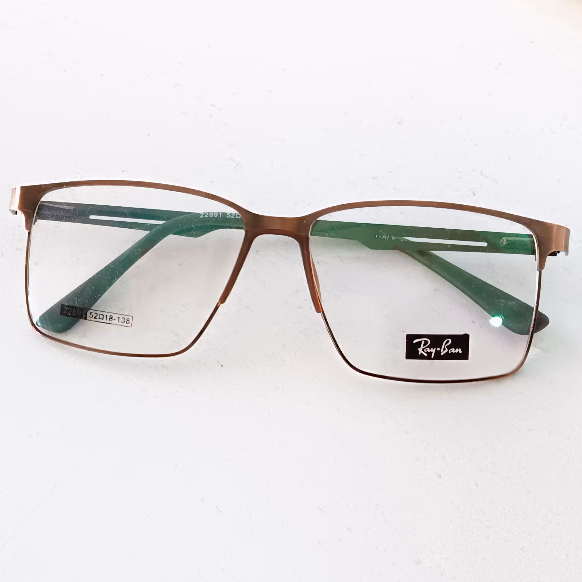 عینک طبی اسپرت سایز حدقه بزرگ روبینی یک تیکه دسته فنر دار با قابلیت تعویض عدسی های طبی نمره دار همراه با جلد و دستمال