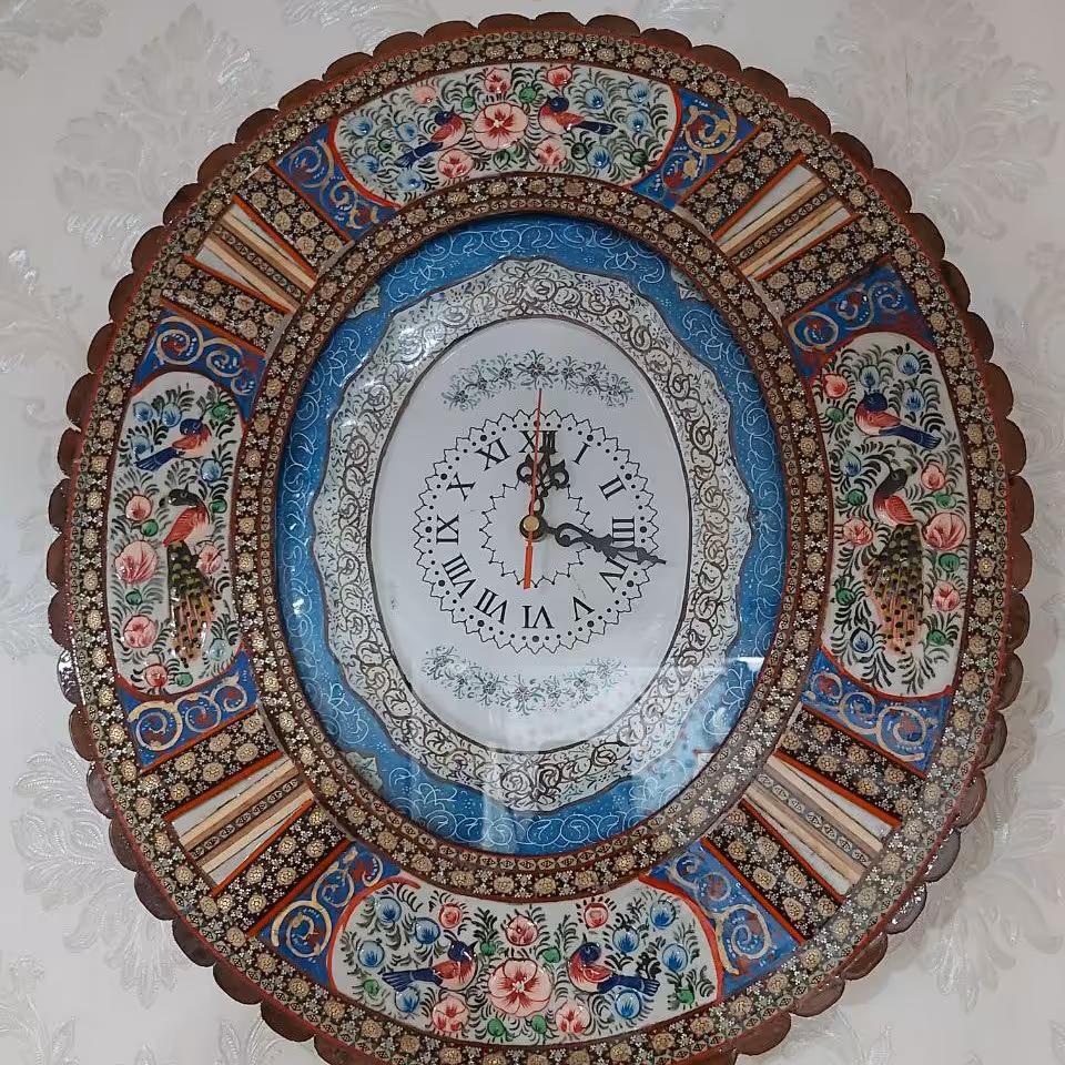 ساعت خاتم ومیناکاری زیبا طرح بیضی و با طرح گل ومرغ