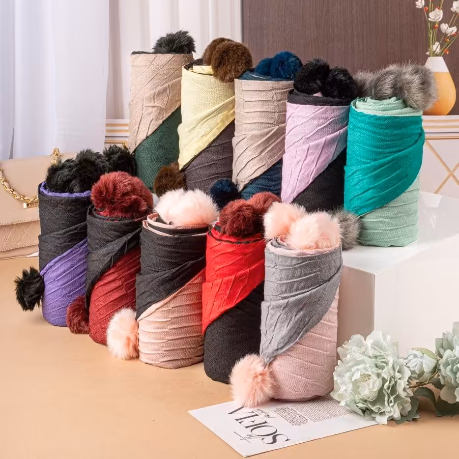 
شال نخی پاییزه دورو پلیسه پوم دار 
بی نظیر

 