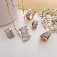 نیم ست ژوپینگ اصل طرح طلا آبکاری طلای 18 عیار صنعتی شامل گردنبند و گوشواره مدل ضربدری کد M336