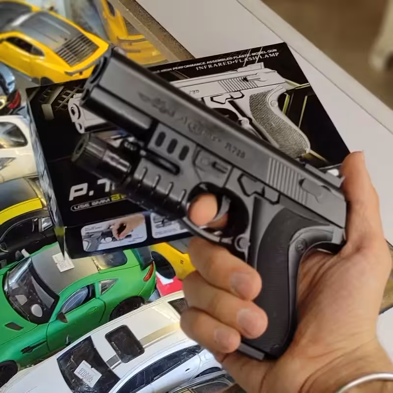 اسباب بازی تفنگ کلت خشابی ساچمه ای لیزری مدل چراغ دار