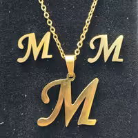 نیم ست استیل رنگ ثابت بدون حساسیت مدل رنگ طلایی مدل حرف M کد 2