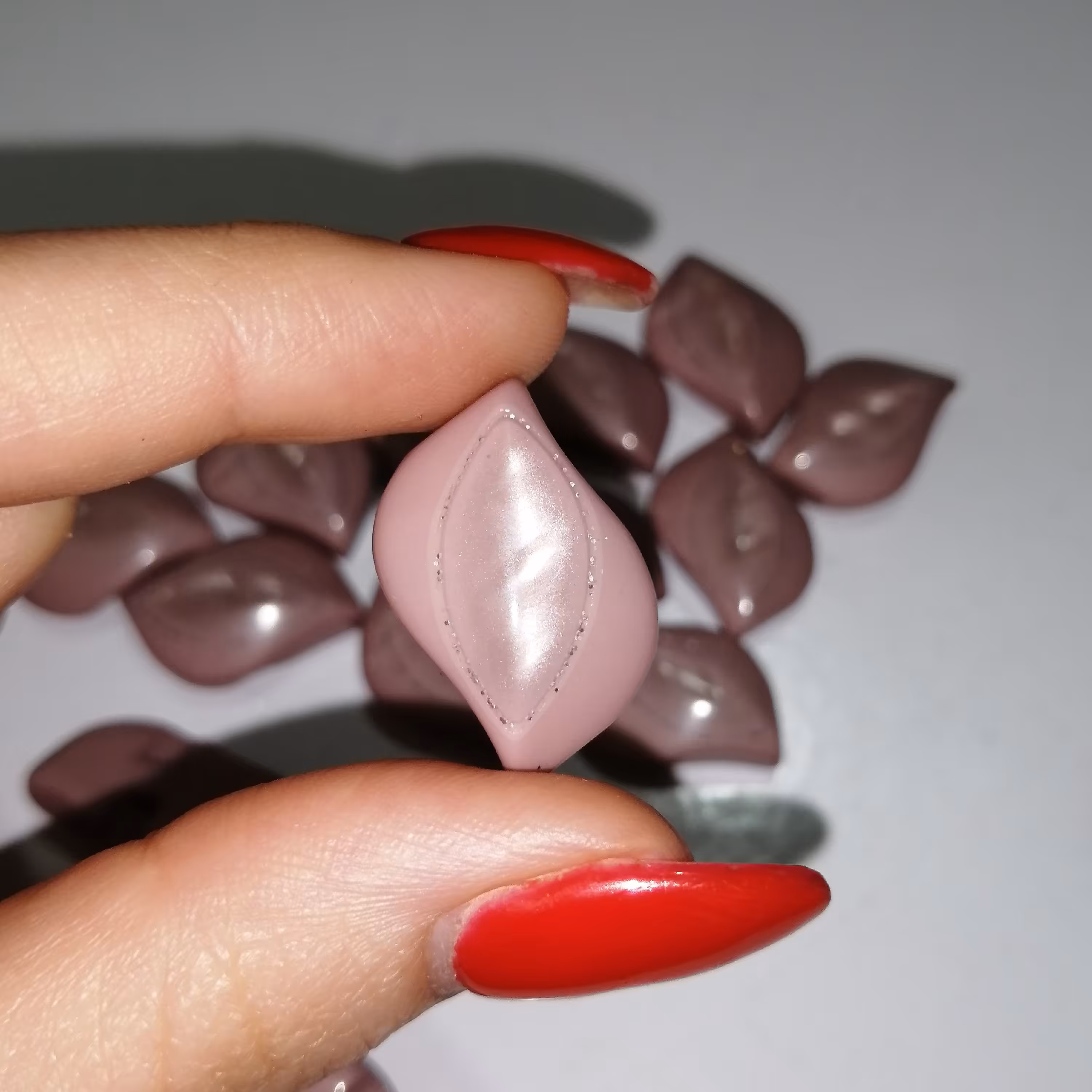 دکمه لباس صورتی کالباسی بسته 7 عددی 