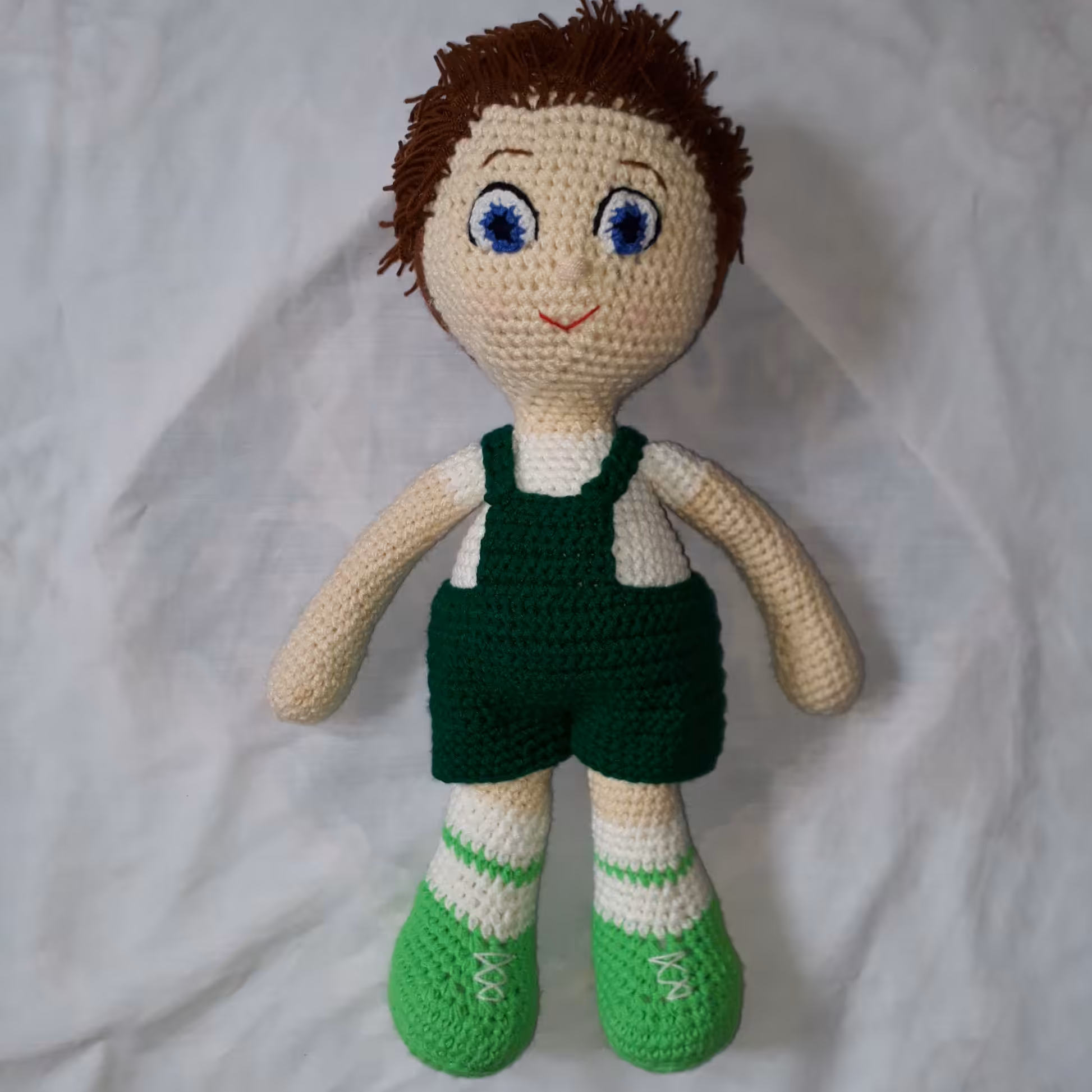 عروسک پسر با لباس سبز رکابی 35 سانت