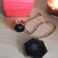 ست انگشتر و گردنبند رزین رنگ مشکی طرح کهکشانی