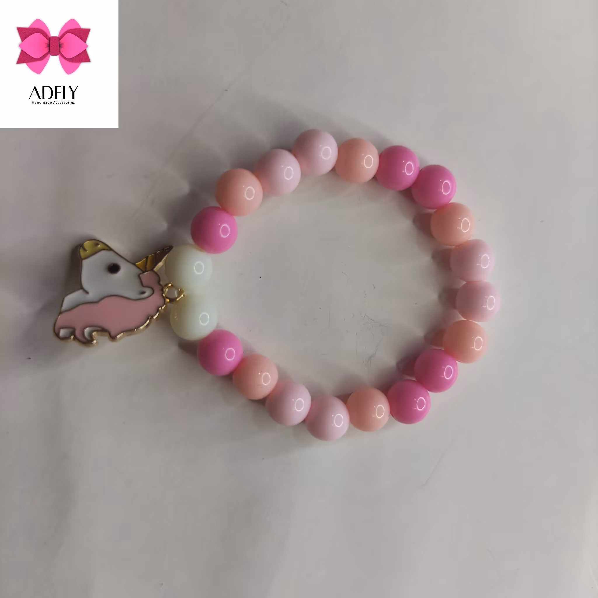 دستبند مرواریدی با آویز تک شاخ کد 401