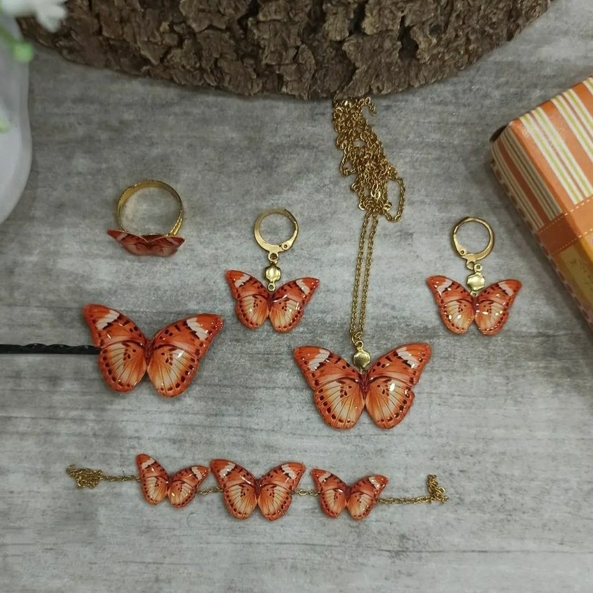 ست پنج تکه ی پروانه ی نارنجی رزینی 