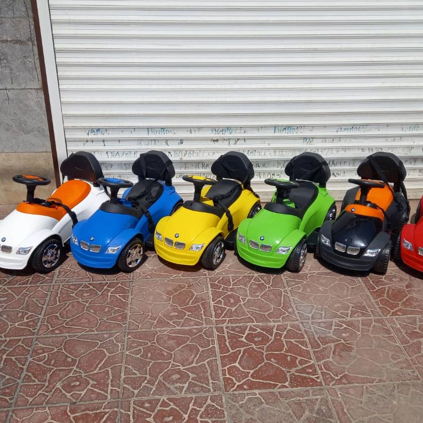 اسباب بازی ماشین شارژی موزیکال با باطری 6 ولت و شارژ بالاباکمربند خلبانی