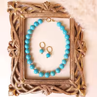 سرویس گردنبند و گوشواره استیل طلایی فیروزه و حدید با رنگ ثابت و بدون حساسیت