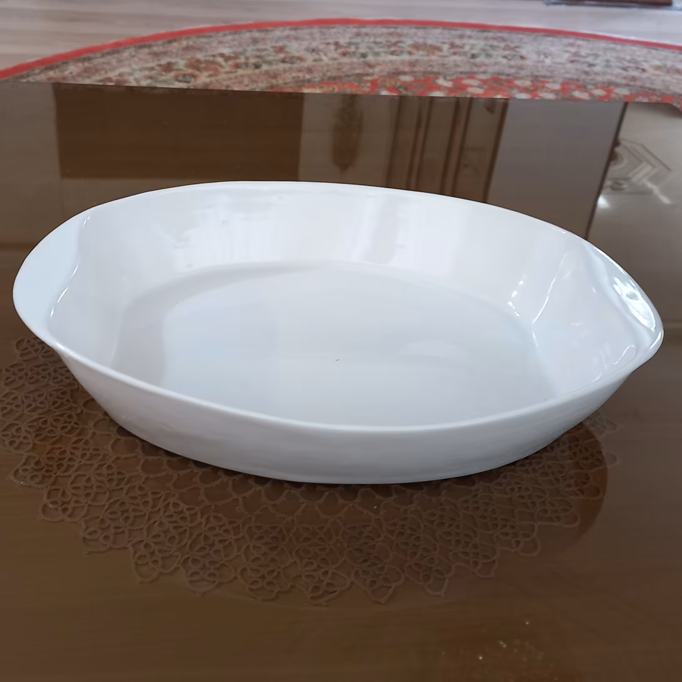تابه بیضی دسته دار  جنس چینی پرسلان مقاوم وزیبا قابل استفاده در ماکروفر و ماشین ظرفشویی 