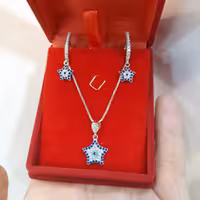 نیمست نقره (بازنجیر)چشم نظر ستاره ای  بسیار شیک با گوشواره کلیپسی  با زنجیر ونیزی ضخامت متوسط  به طول 45 سانتیمتر