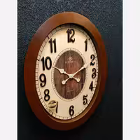 ساعت دیواری شوبرت بیضی تمام چوب دو موتوره 6105