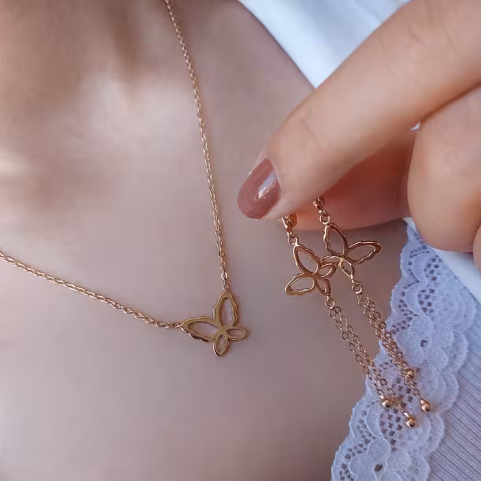 نیمست ژوپینگ طرح پروانه، شامل گوشواره، پلاک و زنجیر، روکش طلا، رنگ ثابت