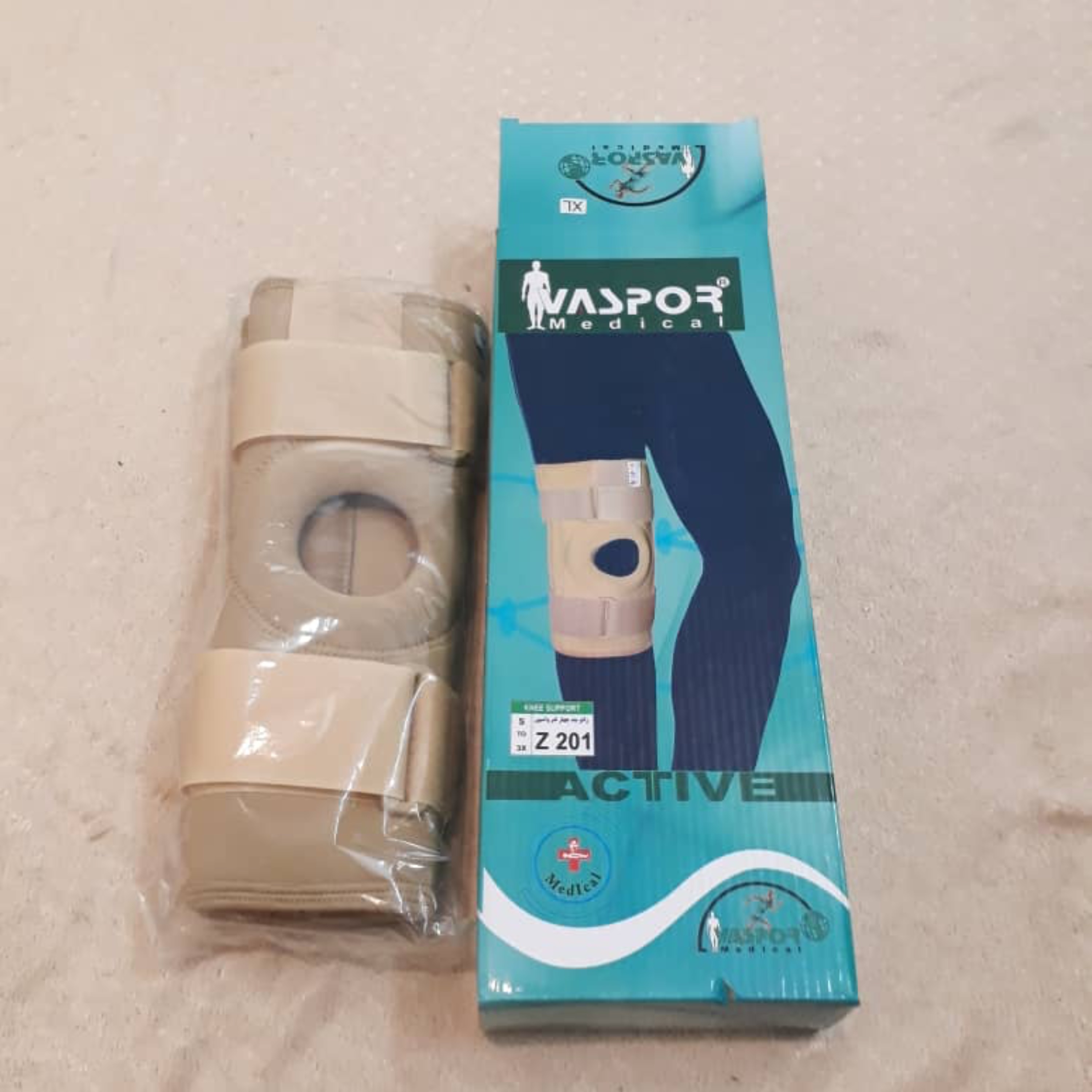زانوبند آتل دار چهار فنره برند واسپور رنگ کرم و مشکی سایز(M-L-XL-2XL)