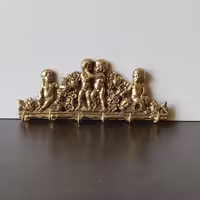 جاکلیدی پسربچه برنجی رنگ سیاه قلم بسیار شیک 