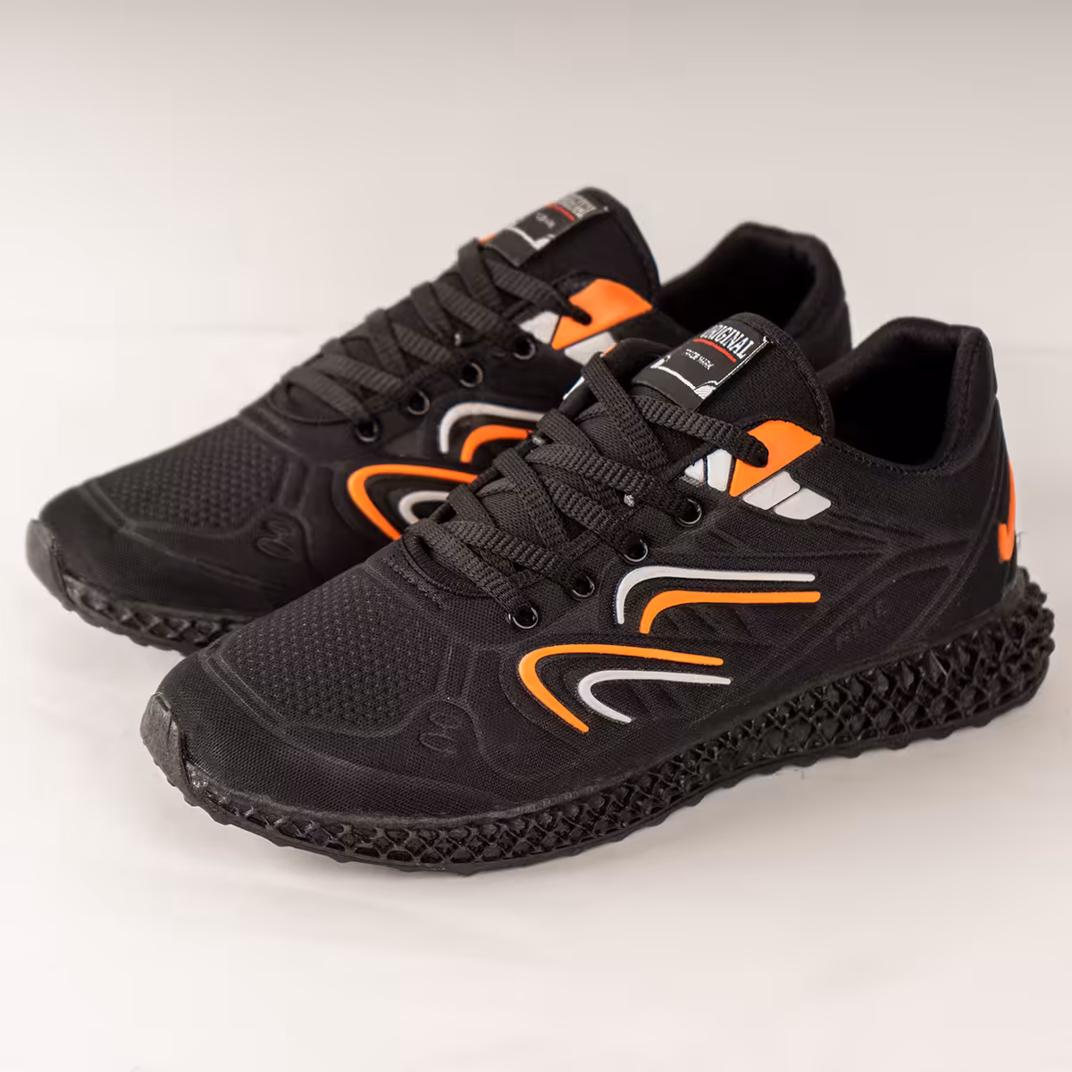 کفش ورزشی مردانه مشکی نارنجی ساکونی ( T) مدل Delon