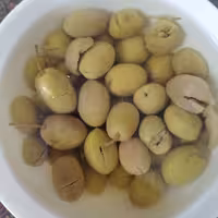 زیتون شکسته رودبار کاملا طبیعی بدون اسانس و مواد افزودنی