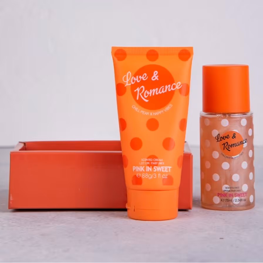 ست بادی اسپلش و لوسیون بدن با پک هدیه طرح خال خالی  رنگ نارنجی 