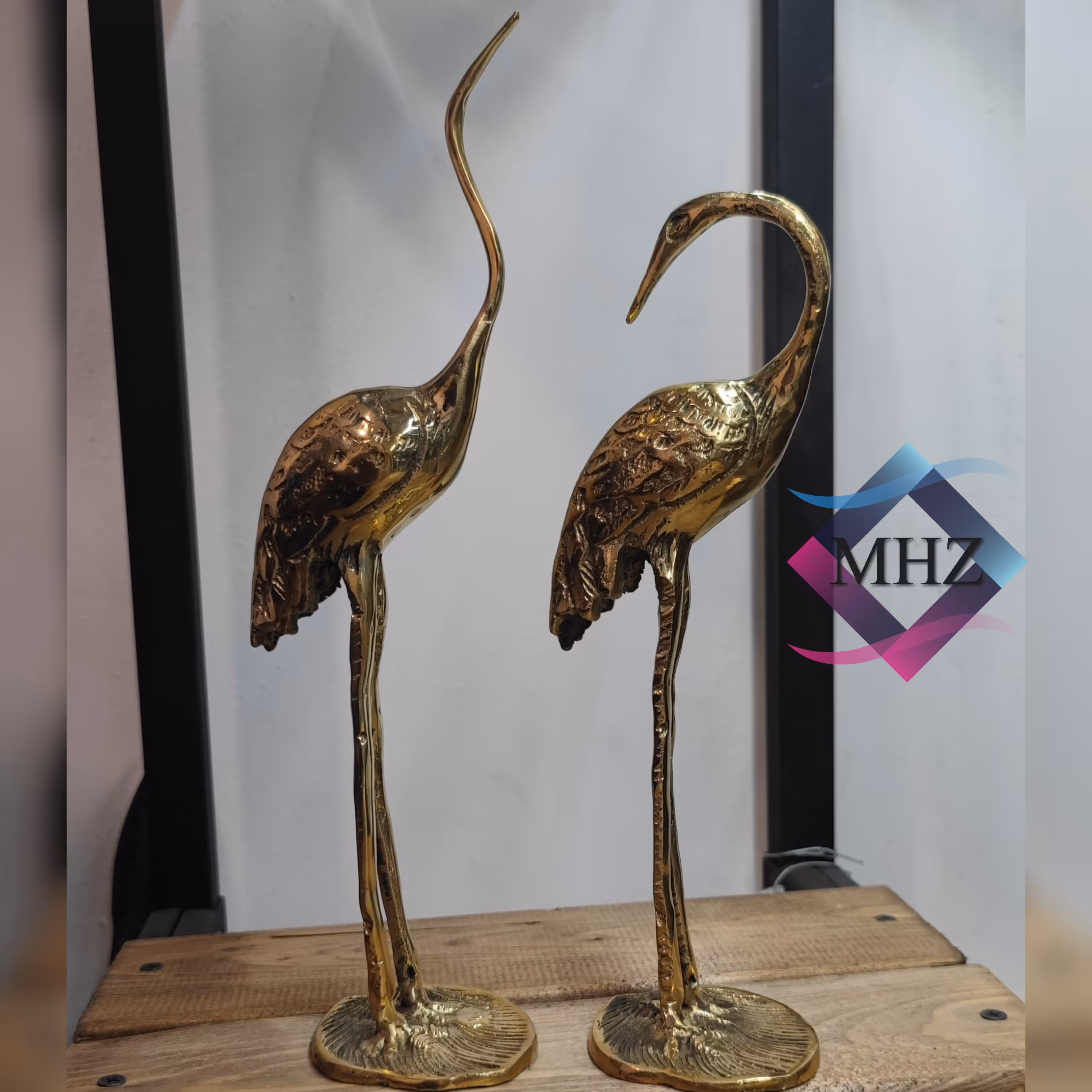 مجسمه برنجی طرح لک لک نر و ماده