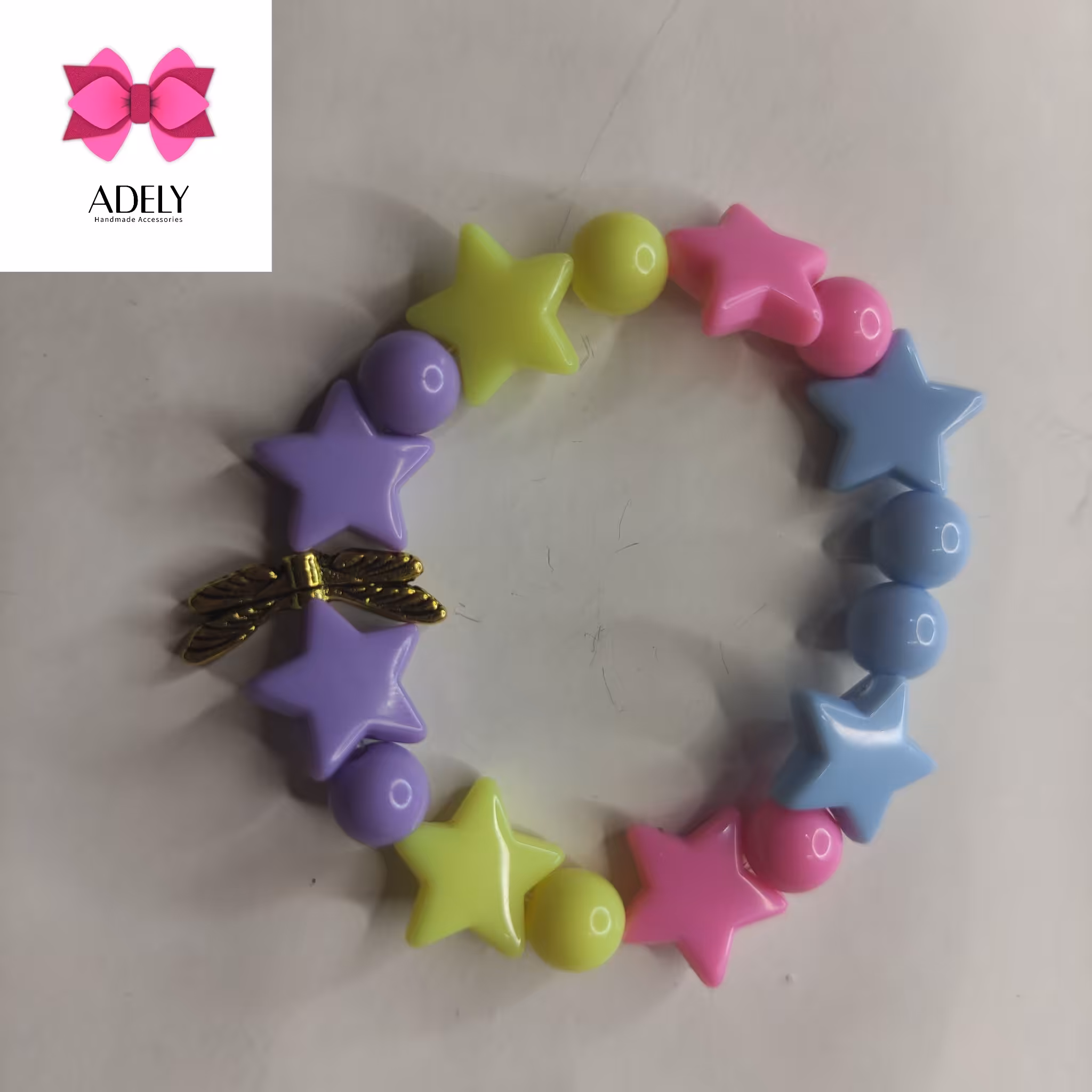 دستبند مهره ی ستاره و مروارید با آویز سنجاقک کد 408